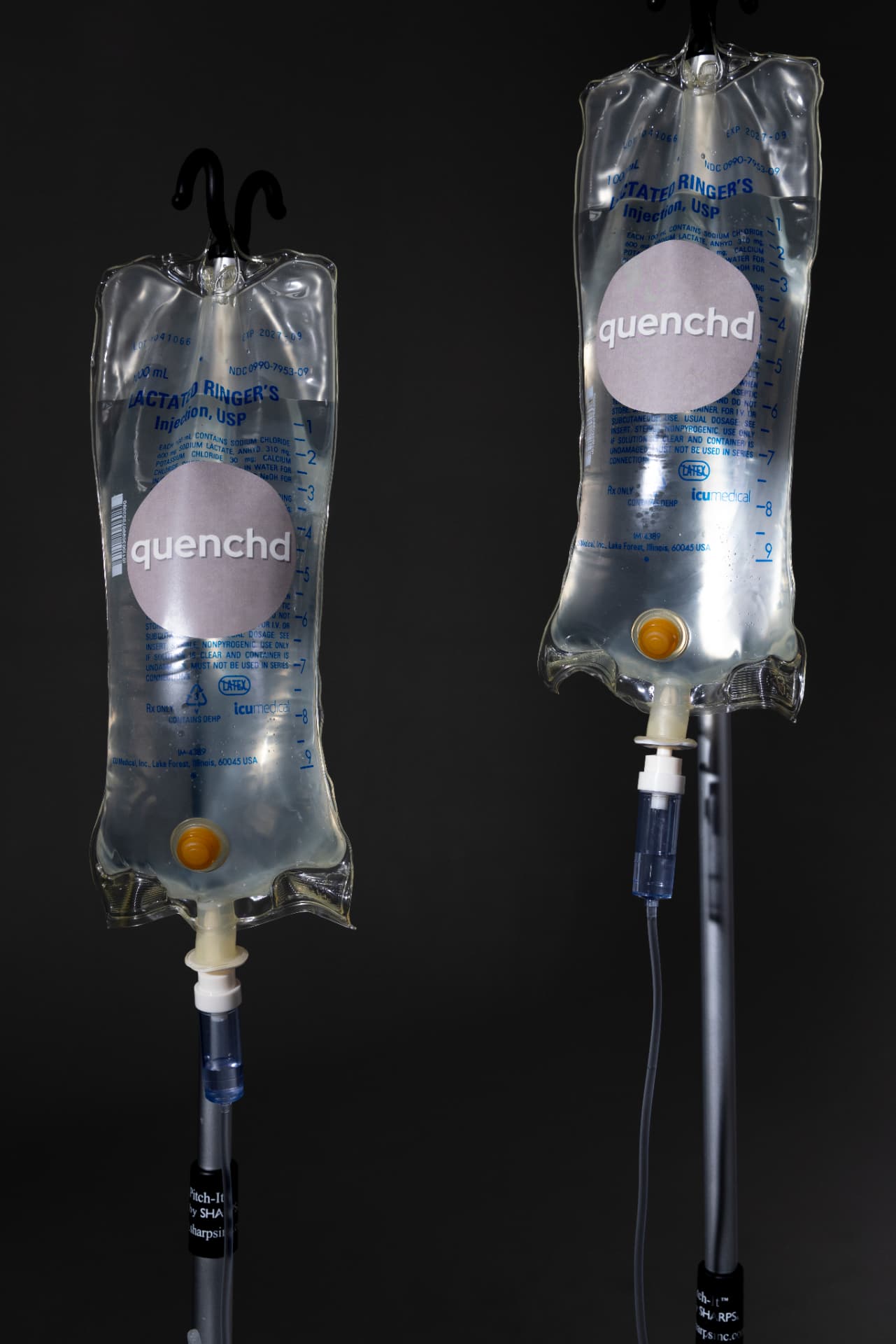 Two Quenchd IV hydration bags ready for mobile appointments